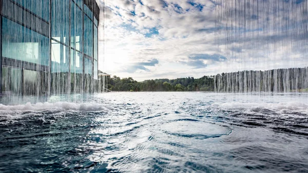 Wasserfall an modernen Glasgebäude mit See und bewölktem Himmel